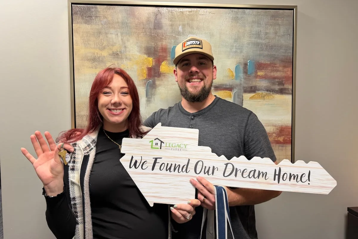Pederson Realty clients celebrating their new home at closing